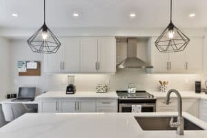 kitchen with upgraded lighting and cabinets